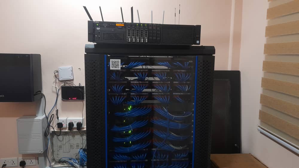 Network cabinet with patch panels, switches and structured cabling